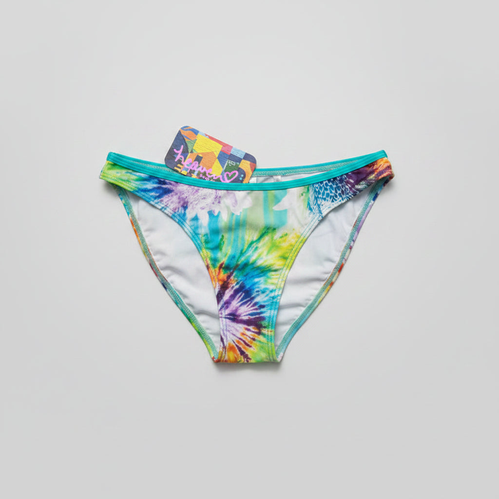 Tie Side bikini has a colorful floral print with shades of blue, green, yellow, and orange, and thin side ties.