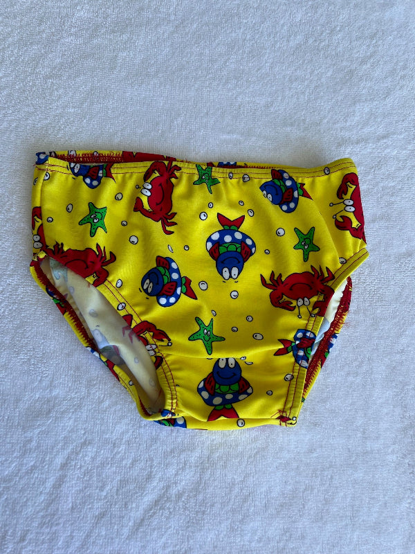 Baby's yellow swim briefs with colorful fish and crab pattern Chlorine Resistant