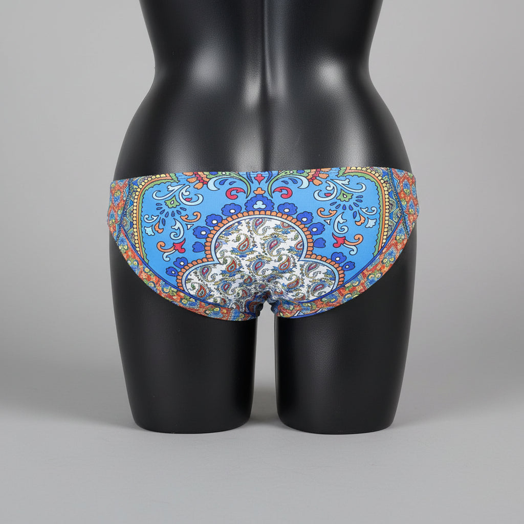 Ginja bikini bottom with a colorful blue, orange, and yellow paisley pattern