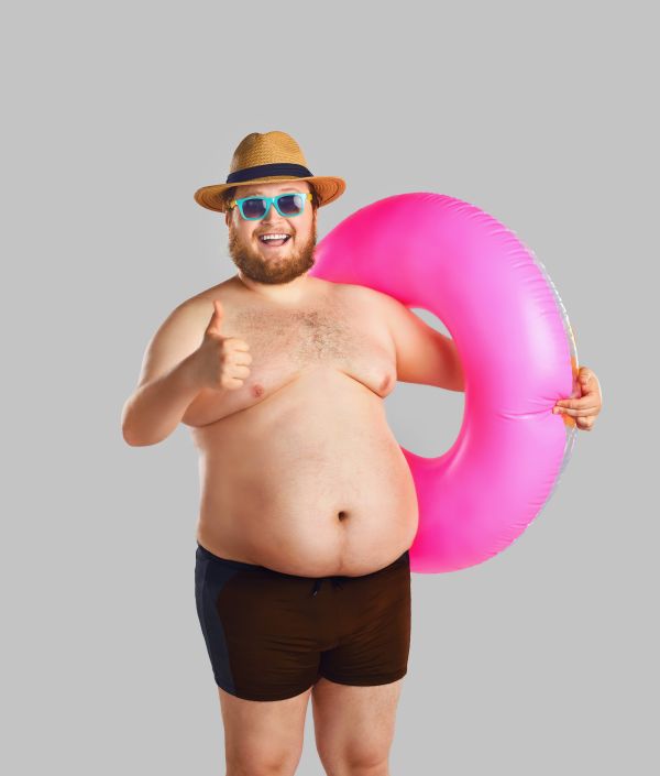 Man wearing black swim trunks